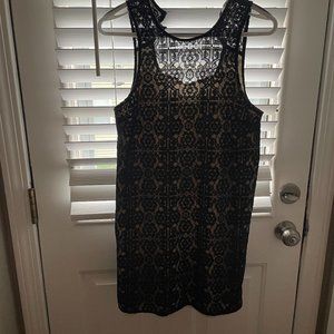 skin colored lining of mini black dress